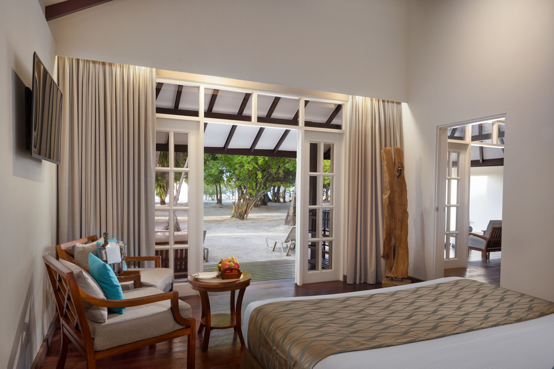Deluxe Beach Villa - view from room - Adaaran Select Meedhupparu - Conch Holidays