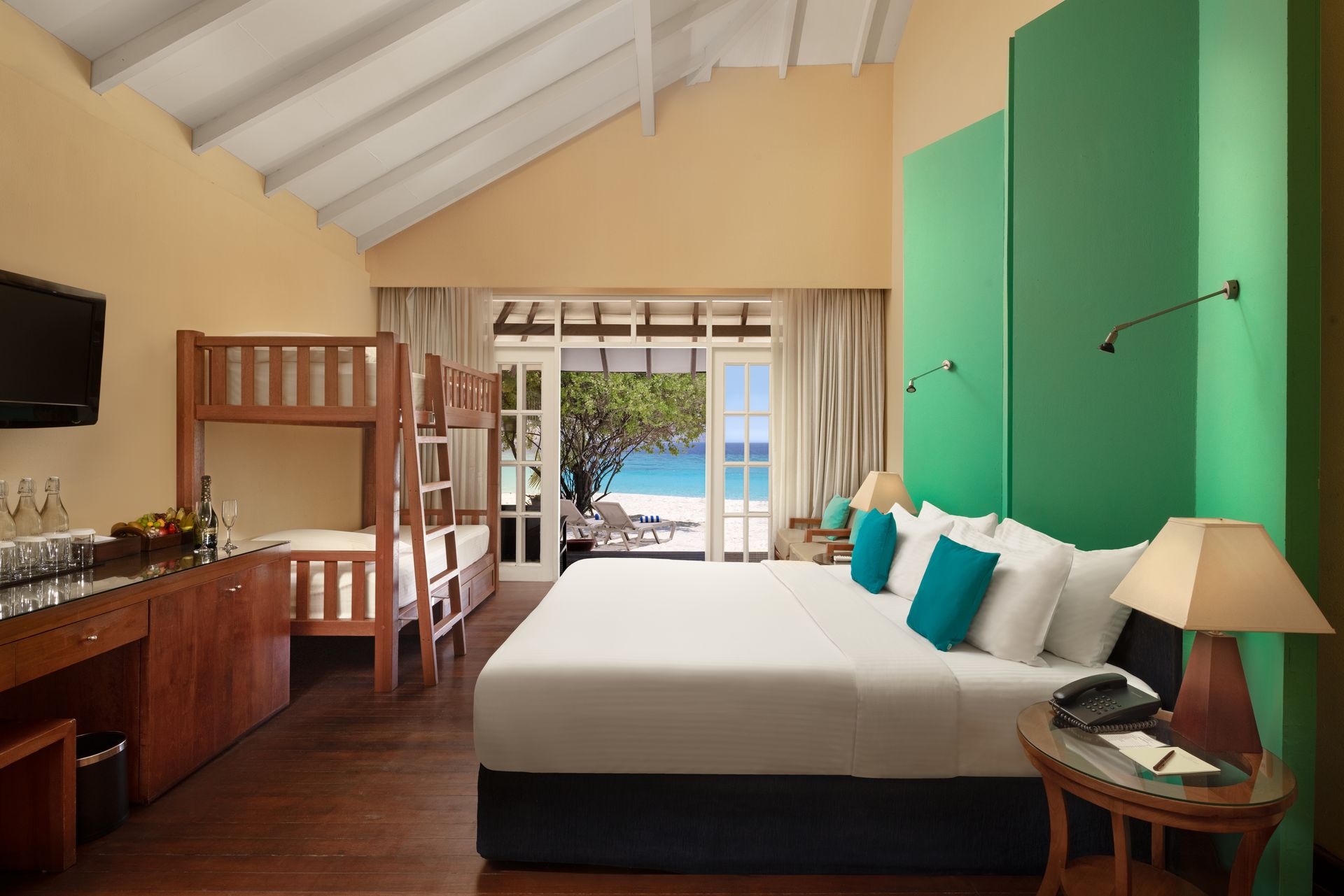 Family Beach Villa_interior with outdoor view_Adaaran Select Meedhupparu_Conch Holidays