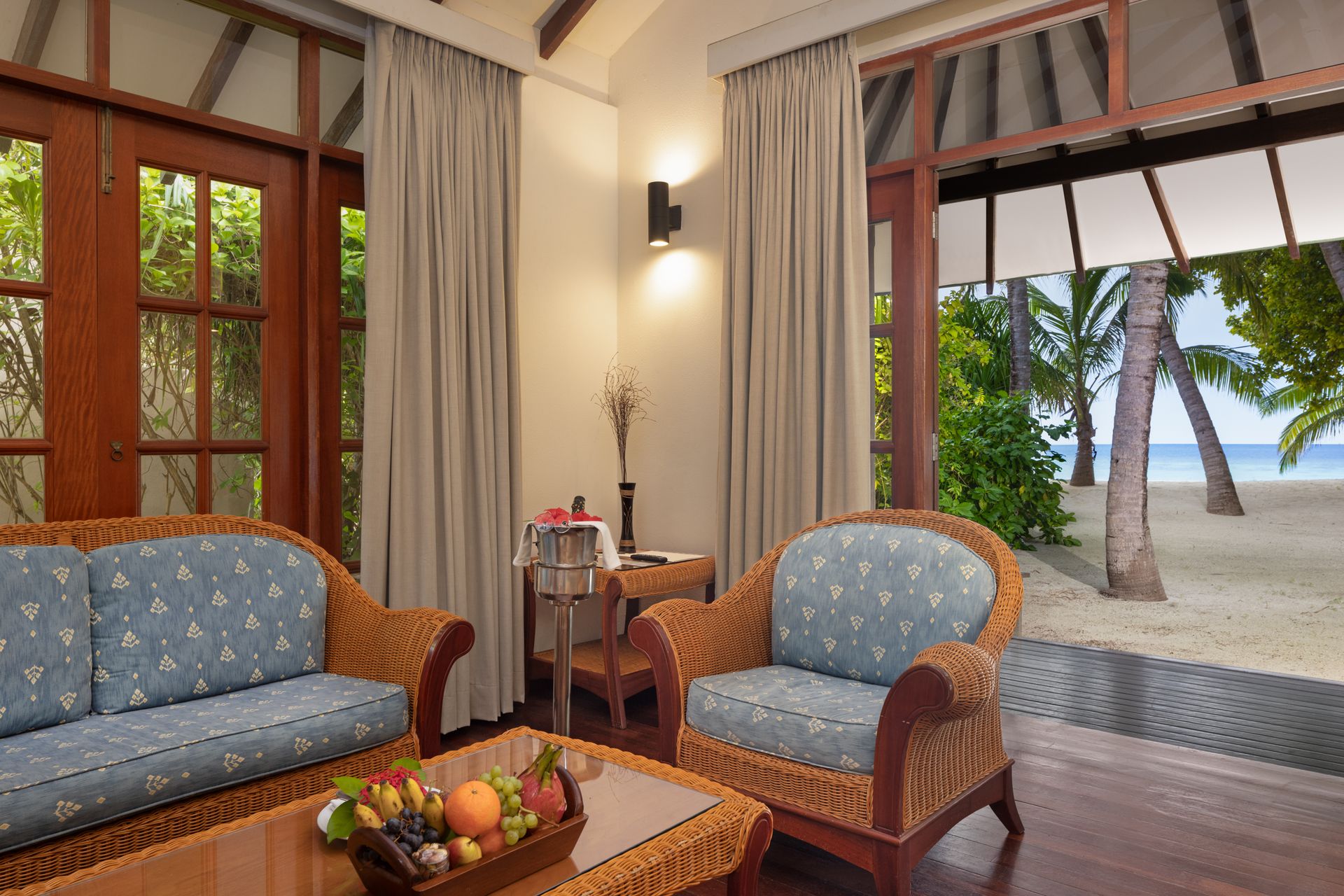 Honeymoon-suite-living area-seating_Adaaran Select Meedhupparu_Conch Holidays