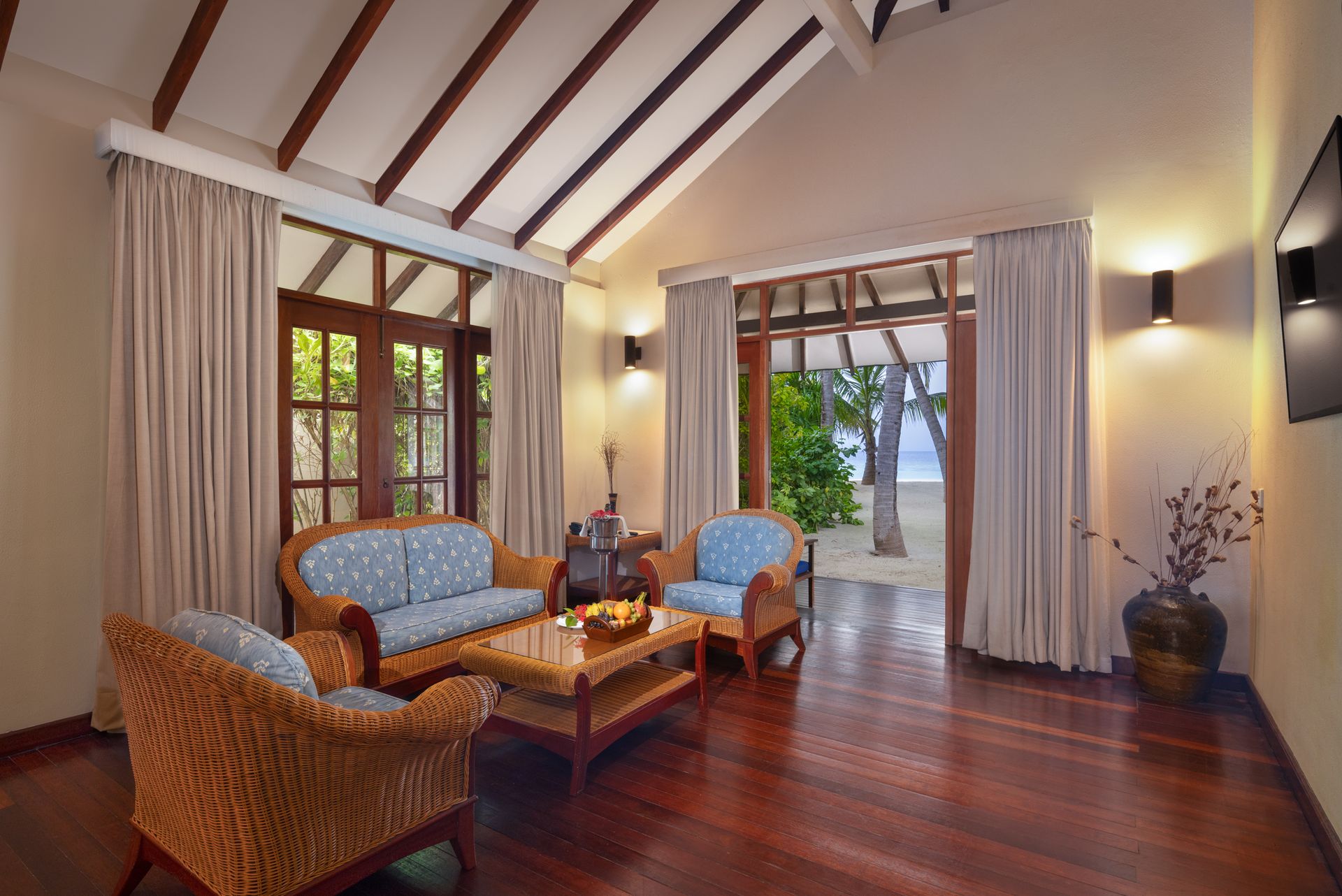 Honeymoon-suite-living area_Adaaran Select Meedhupparu_Conch Holidays