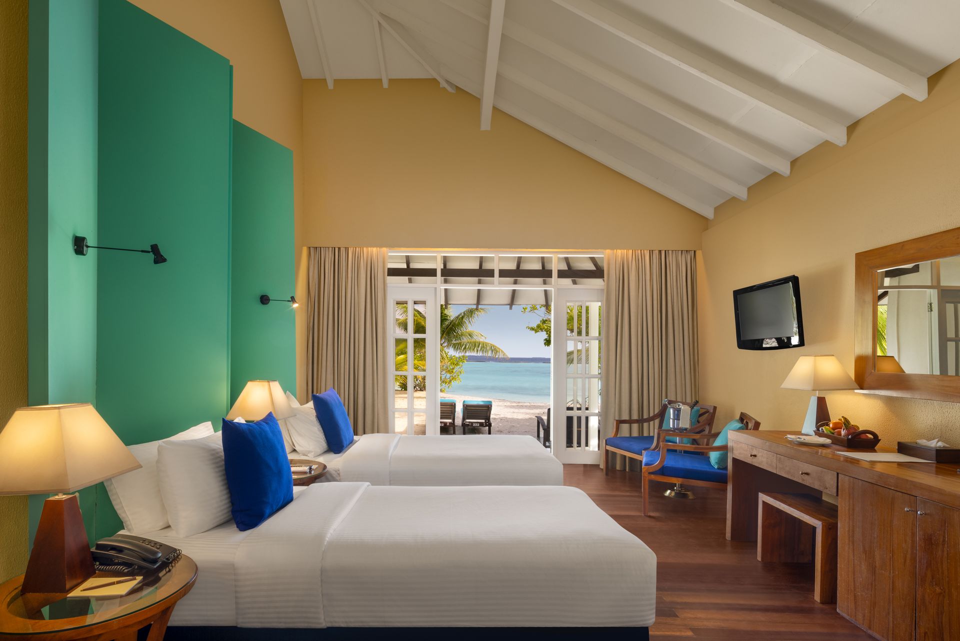Two-Bedroom Family Beach Villa-bedroom 1_interior_Adaaran Select Meedhupparu_Conch Holidays