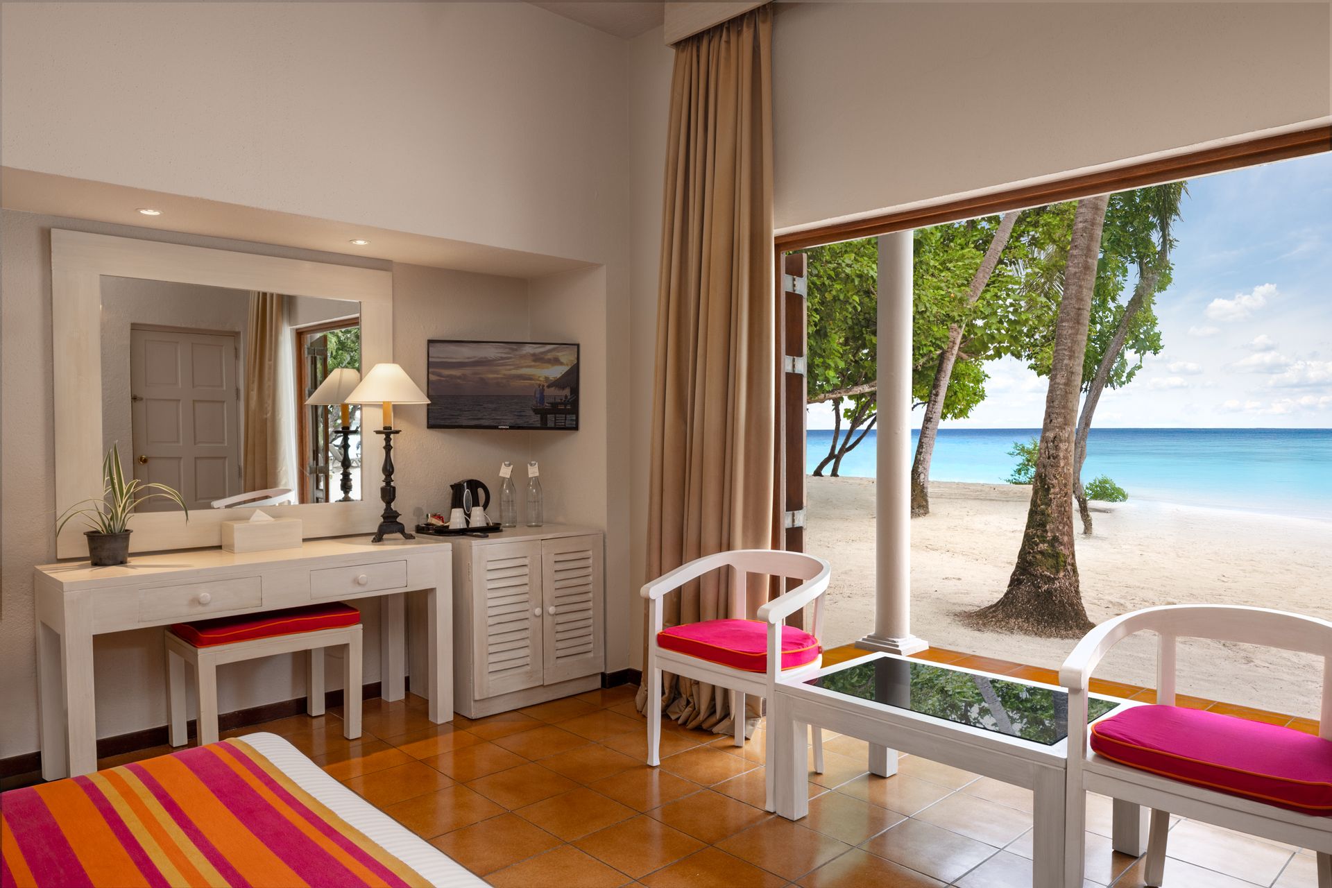 classic-beach-view-room_indoor seating and view from room_Adaaran Club Rannalhi_Conch Holidays